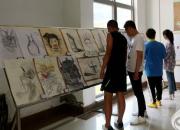 工校18級(jí)建裝班學(xué)生用手中畫筆向中國共產(chǎn)黨建黨98周年獻(xiàn)禮